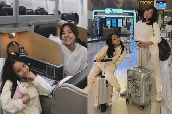 Navya Nair dan putrinya di pesawat dan bandara, siap bepergian ke Australia.