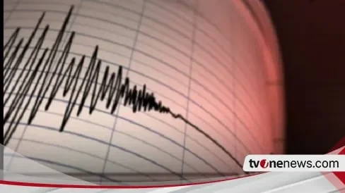 Grafik seismogram, menunjukkan rekaman getaran gempa bumi pada kertas grafik.
